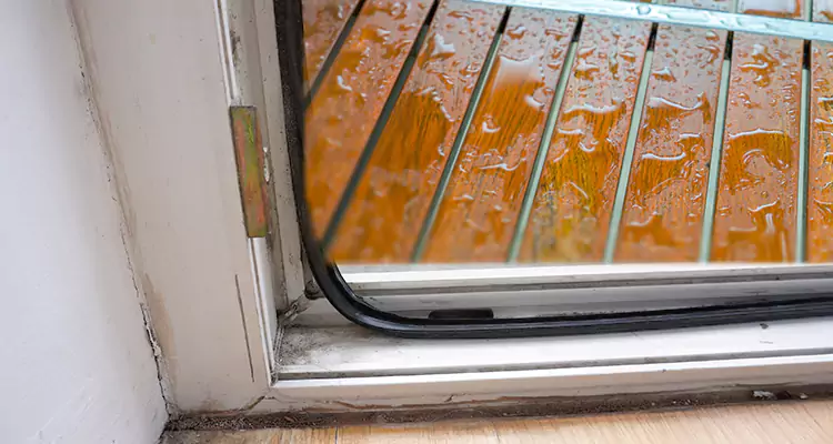 Water Leaking Wooden Patio Doors Repair in Brent, FL
