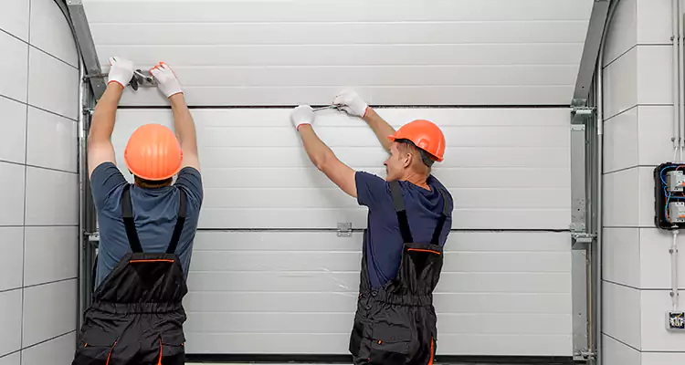 Garage Door Bottom Panel Repair in Brent, FL